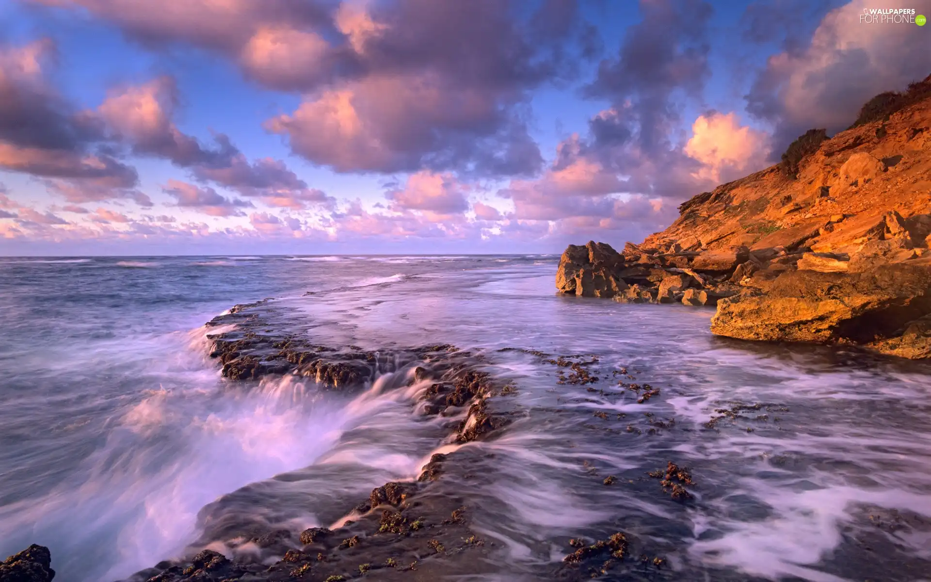 Ocean, clouds, rocks